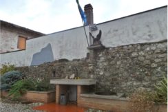 Porzione di bifamiliare in corte