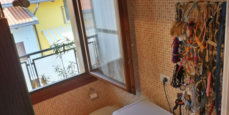 Tricamere con terrazzo vivibile e giardino comune
