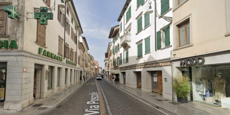 Negozio con canna fumaria